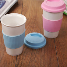 Load image into Gallery viewer, Porcelain Tea or Coffee Mug with Silicone Sleeve